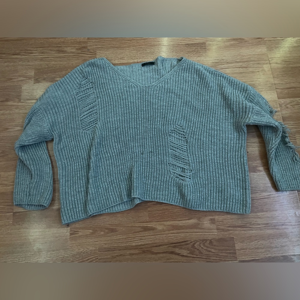 Cut sweater